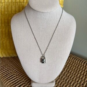 Chanel Silver Padlock Pendant on 19” Chain with Magnet Closure.
